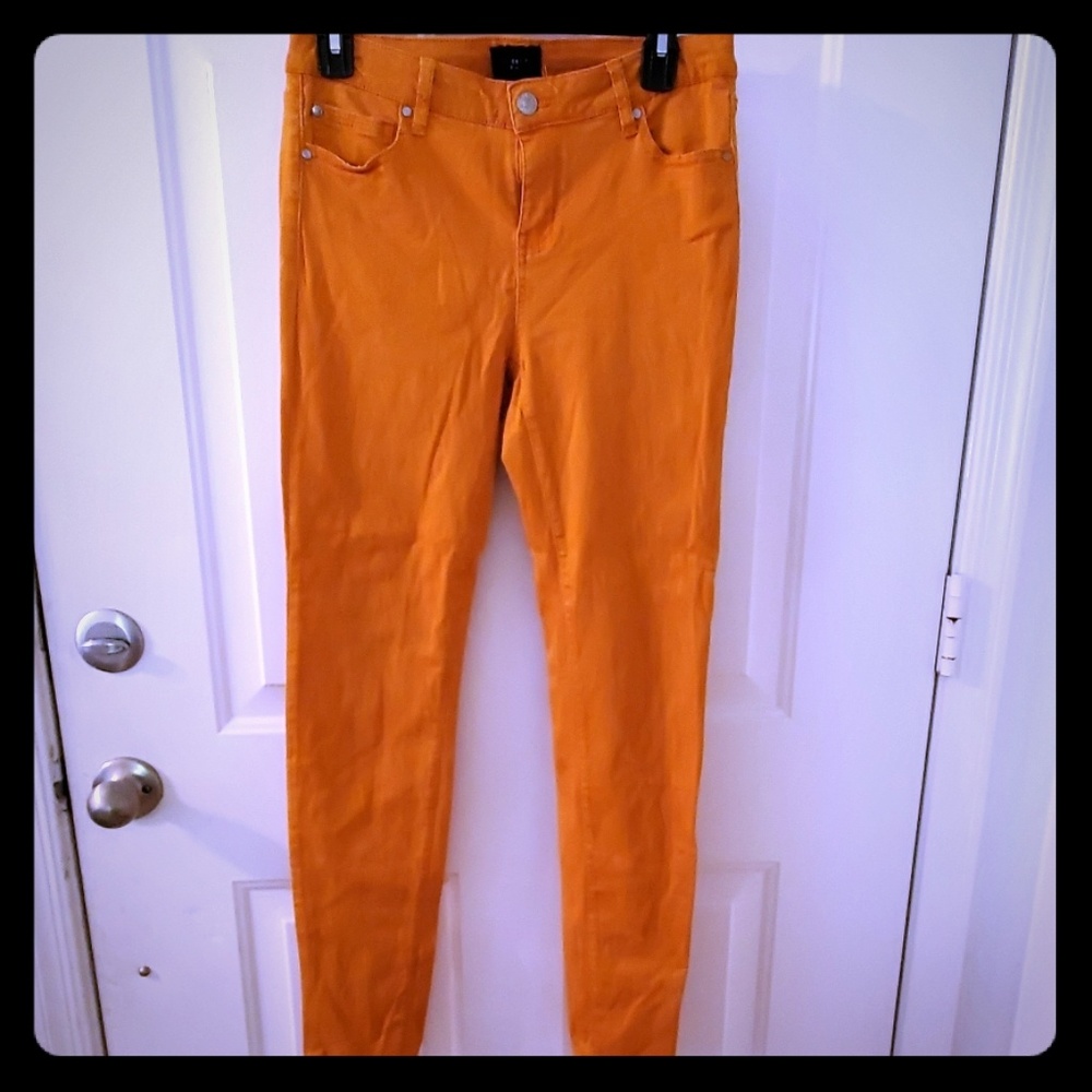 Celebrity Pink orange skinny jesns